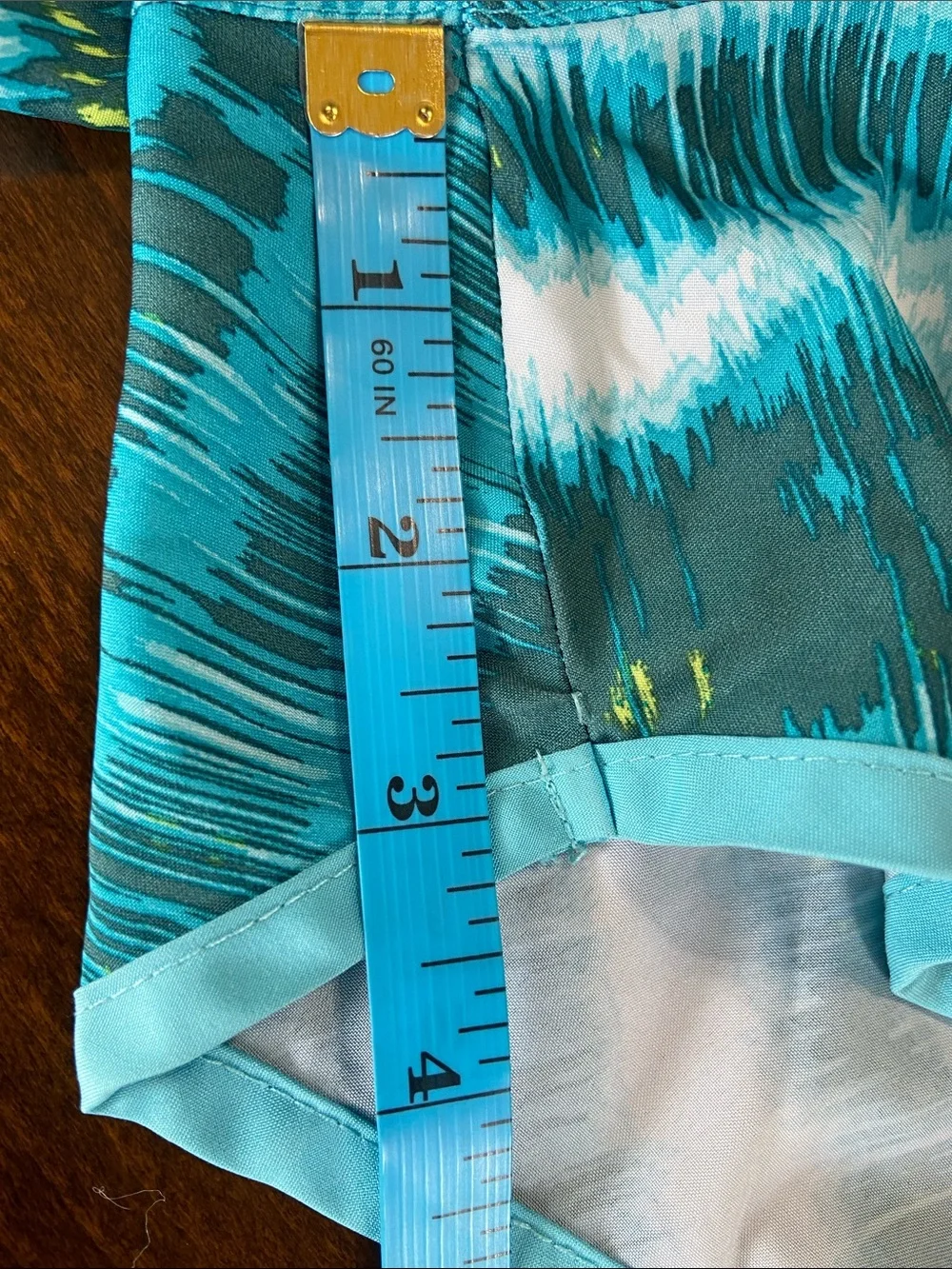 Nike Teal, White and Yellow Patterned Women’s Athletic Shorts. Size M